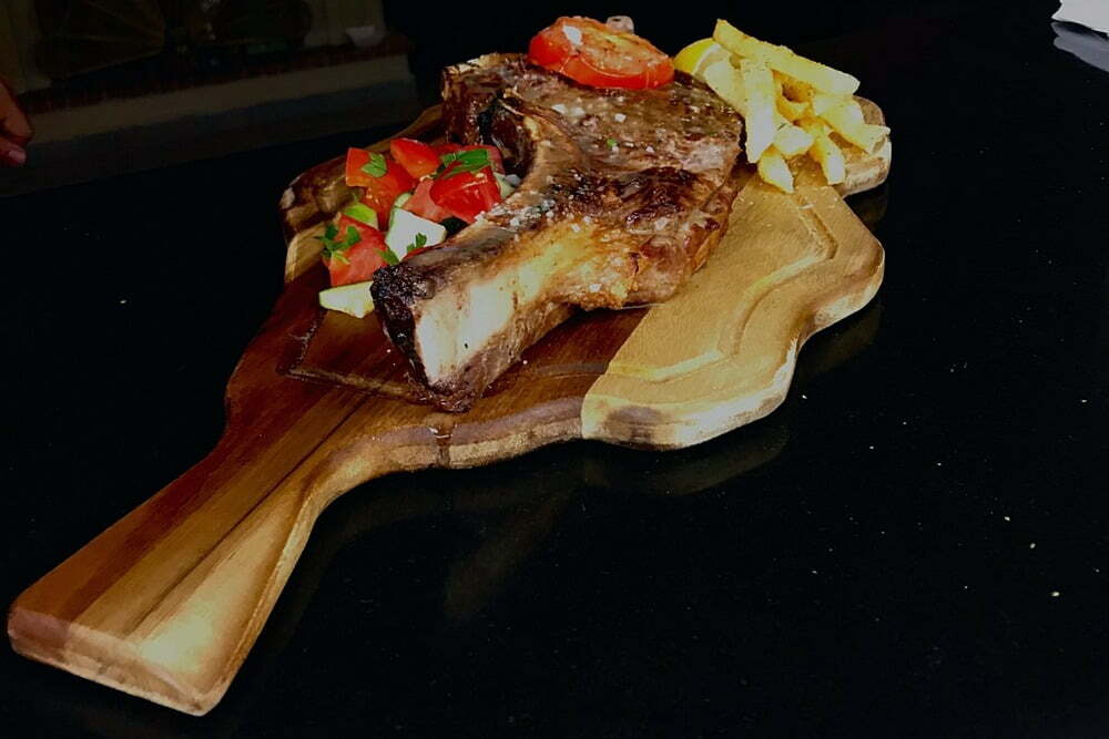 Olive Lounge - image of a tomahawk steak